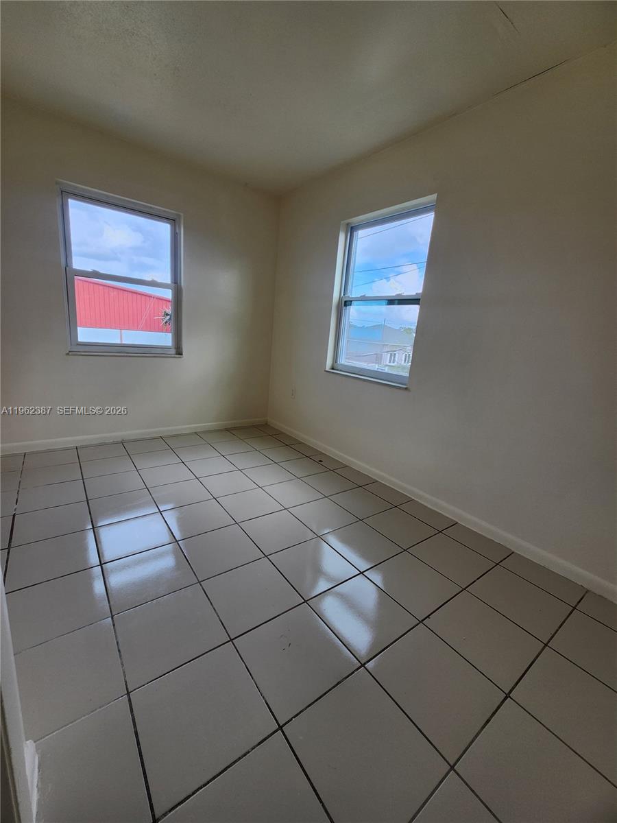 4131 Commercial Drive Sebring, FL 33870 - Photo 12 of 20 a view of a room that has a window in it