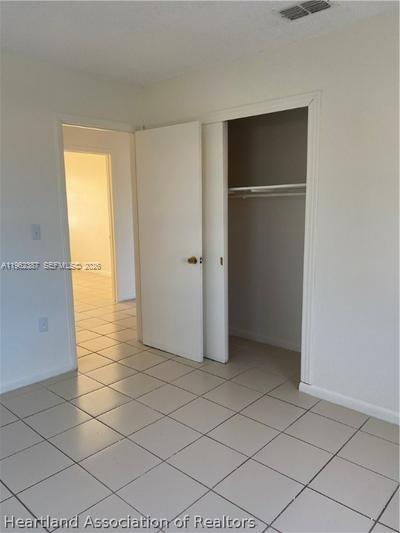 4131 Commercial Drive Sebring, FL 33870 - Photo 19 of 20 a view of an empty room