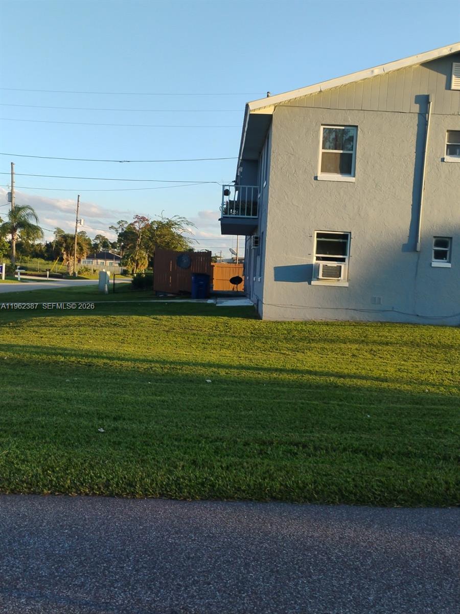 4131 Commercial Drive Sebring, FL 33870 - Photo 3 of 20 a house view with swimming pool in front of it
