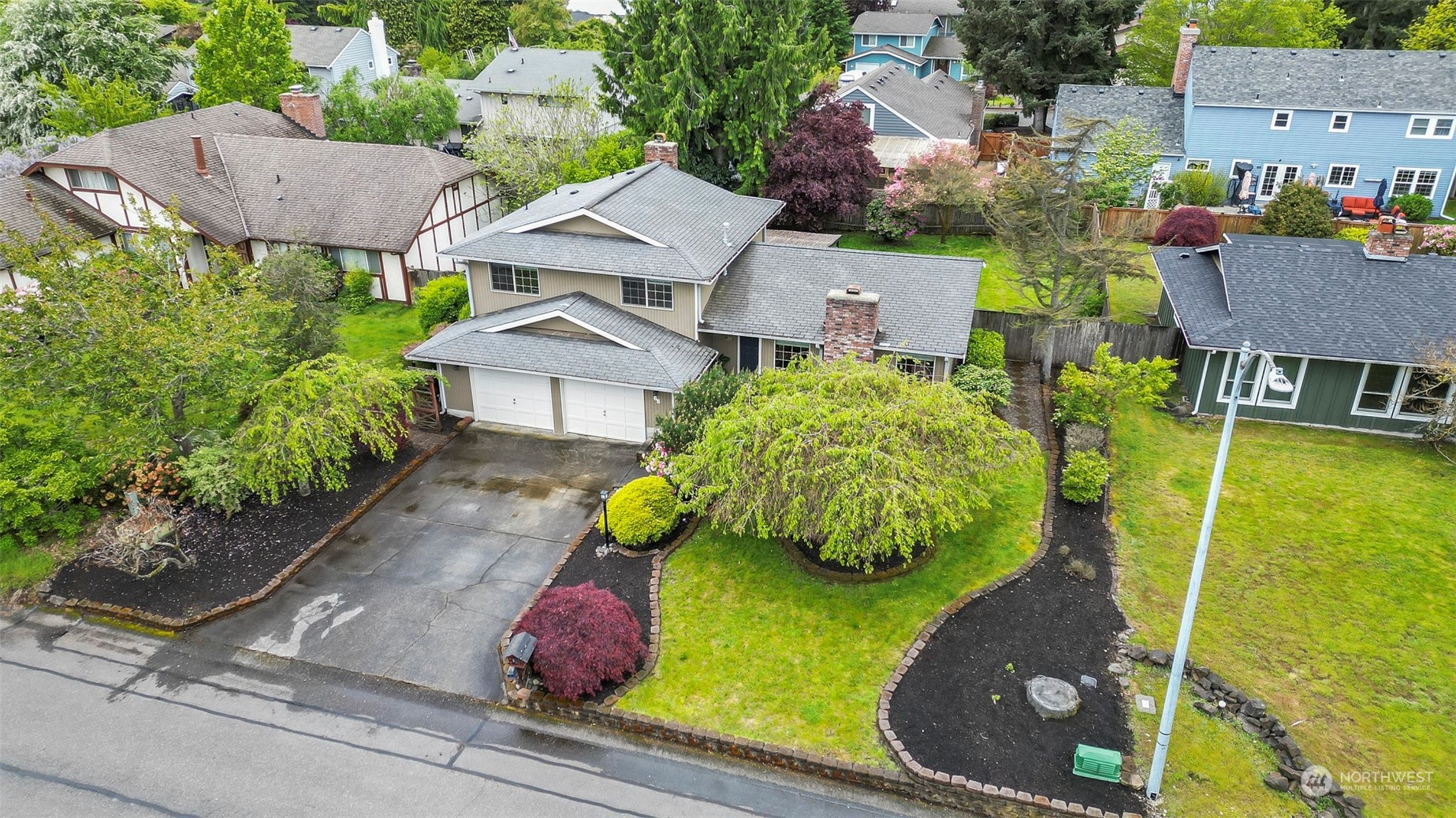 66 Bonney Street Steilacoom, WA 98388 - Photo 2 of 40 an aerial view of a house with garden space and street view