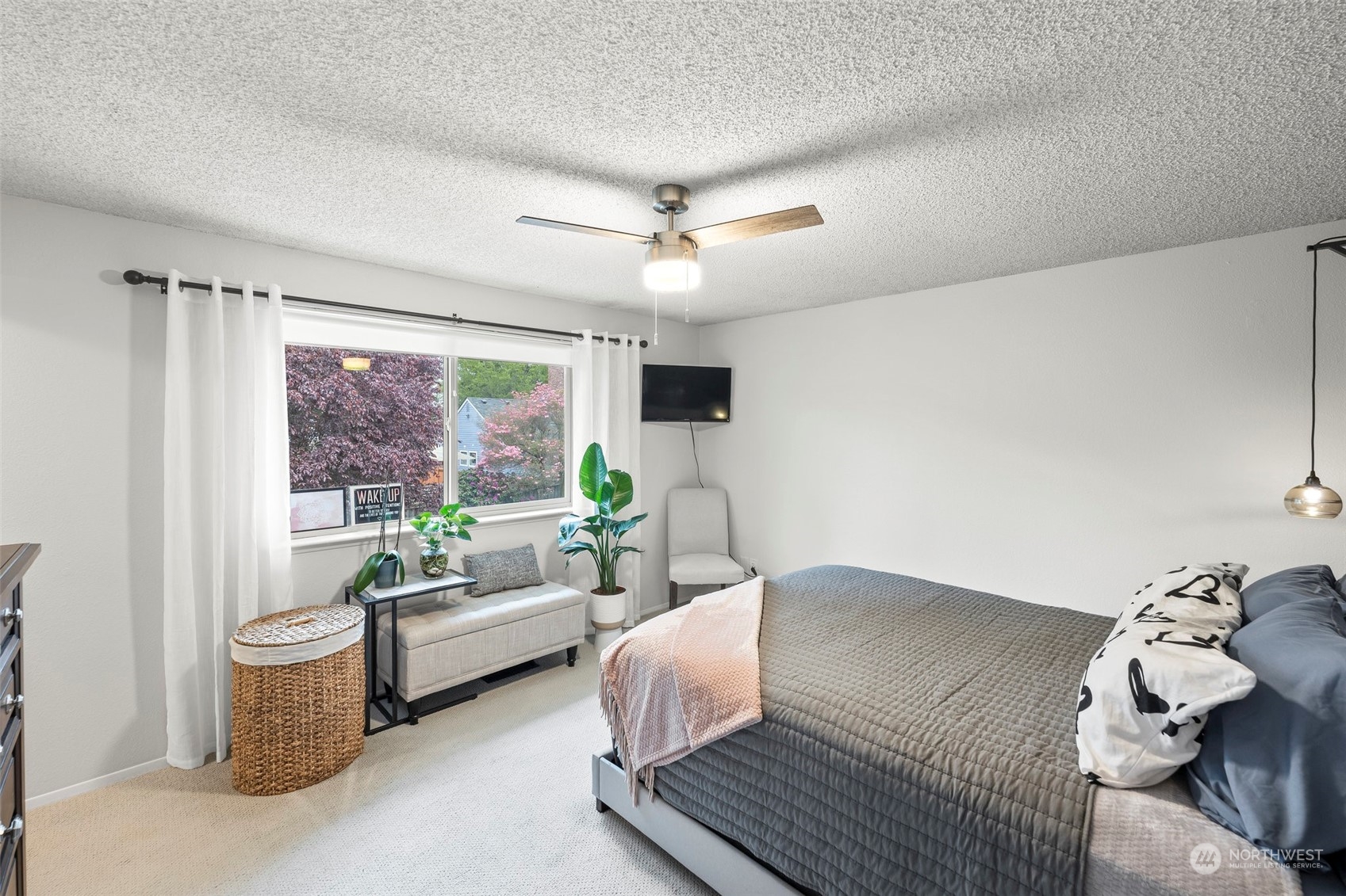 66 Bonney Street Steilacoom, WA 98388 - Photo 21 of 40 a bedroom with a bed and a couch