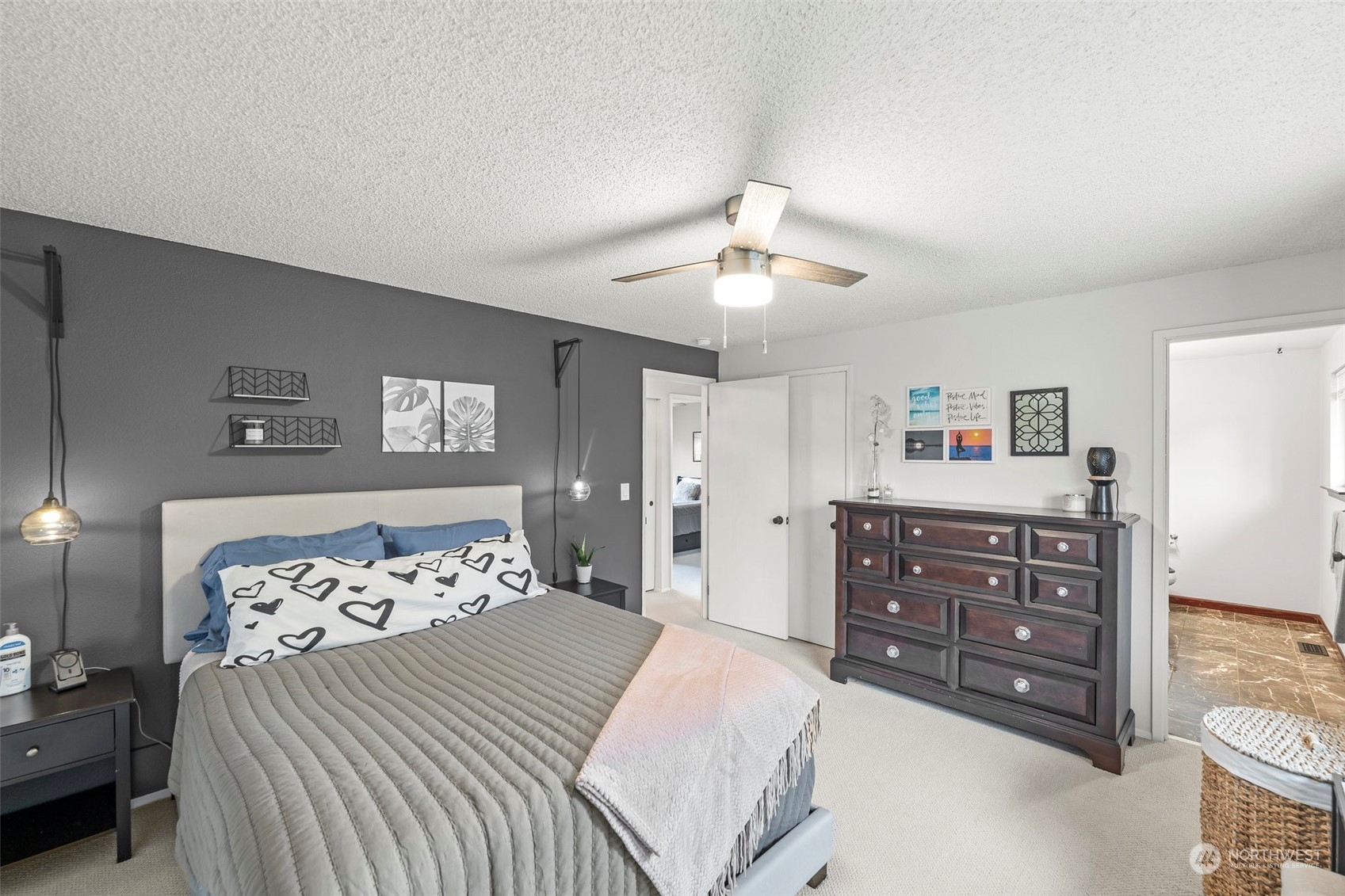 66 Bonney Street Steilacoom, WA 98388 - Photo 22 of 40 a bedroom with a bed and a dresser