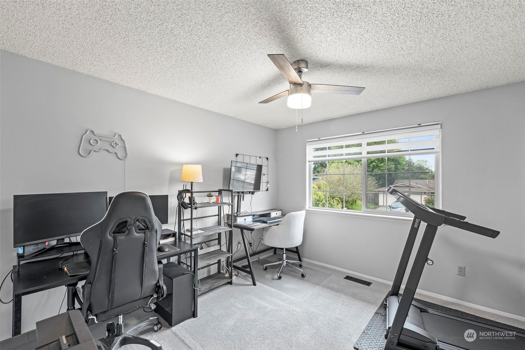 66 Bonney Street Steilacoom, WA 98388 - Photo 28 of 40 a view of a workspace with furniture and a window