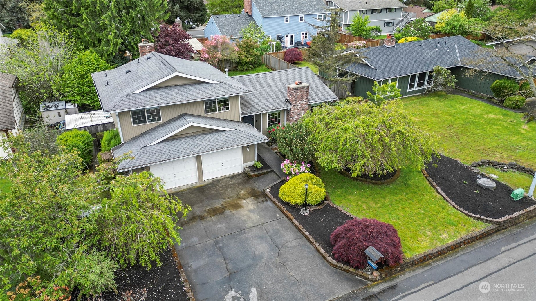 66 Bonney Street Steilacoom, WA 98388 - Photo 38 of 40 an aerial view of a house with swimming pool garden and patio