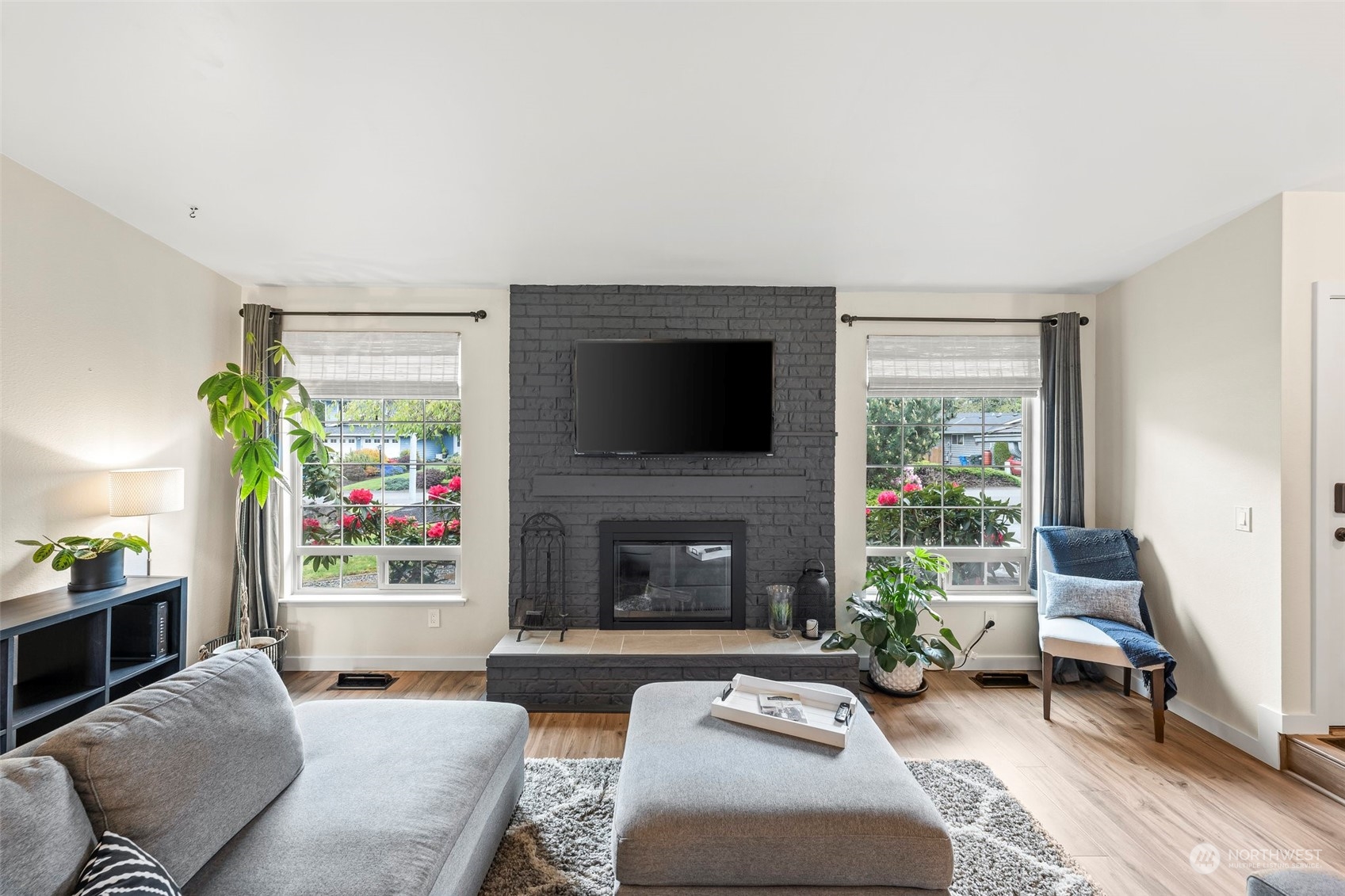 66 Bonney Street Steilacoom, WA 98388 - Photo 5 of 40 a living room with furniture and a fireplace