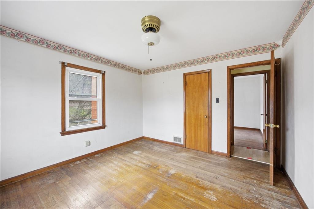 105 Pine Street Trafford, PA 15085 - Photo 14 of 22 a view of an empty room and window