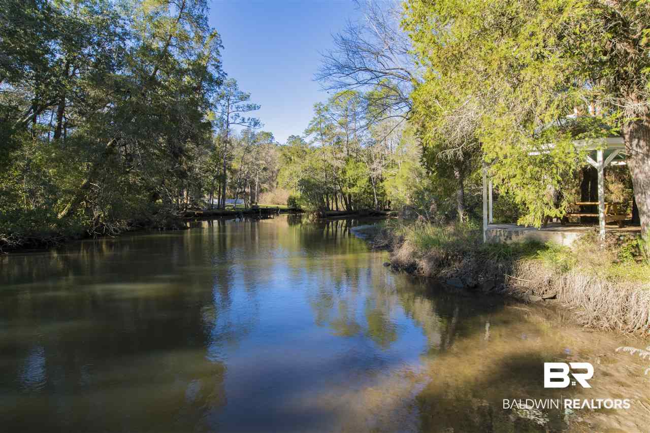 11064 Rosa Court Fairhope, AL 36532 - Photo 5 of 50 Navigable water with bulkhead. Goes to Fish River