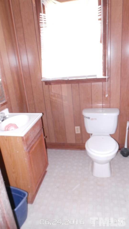 2401 Kittrell Road Kittrell, NC 27544 - Photo 8 of 14 a bathroom with a toilet and a bathtub