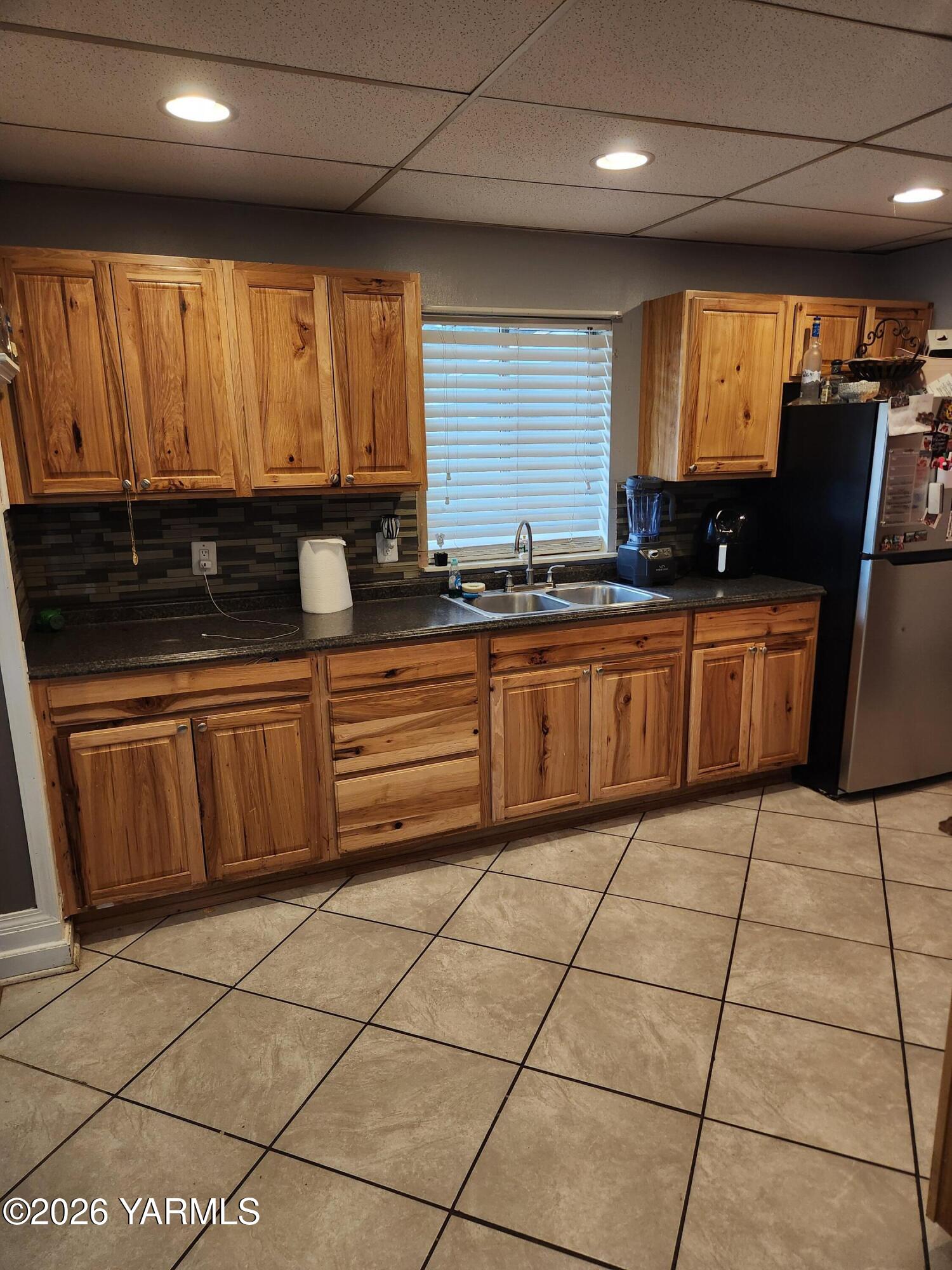 2704 Summitview Avenue Yakima, WA 98902 - Photo 6 of 13 a kitchen with stainless steel appliances a sink and cabinets