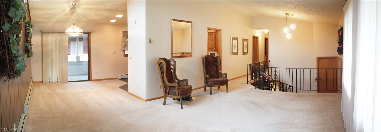 2888 Pressler Road Uniontown, OH 44685 - Photo 26 of 26 View of open floor plan with living and dining spaces.