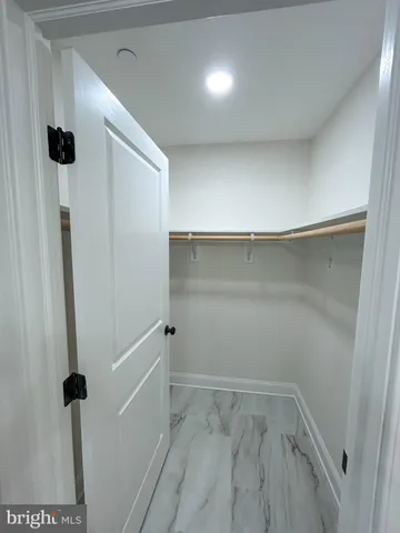 a view of a room with rack on the wall