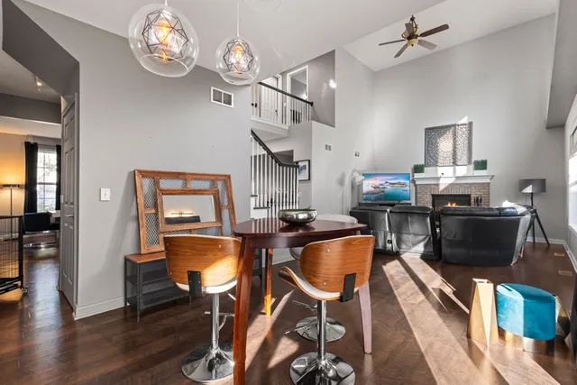 a bedroom with a bed chair and a window