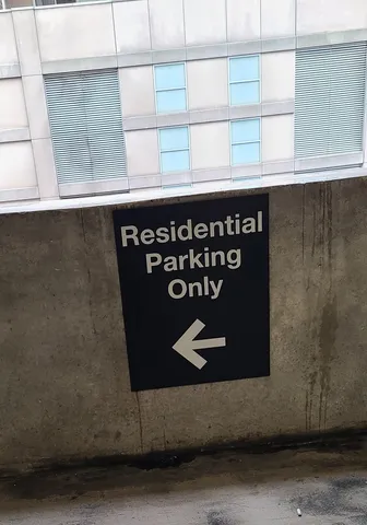 a black refrigerator freezer sitting inside of a kitchen