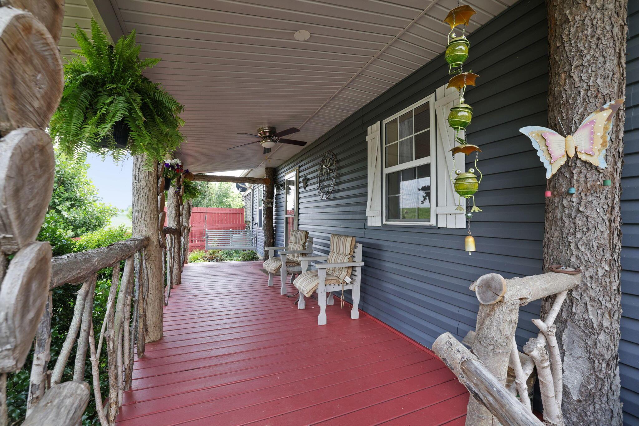 24629 Huffines Road Rockbridge, OH 43149 - Photo 2 of 46 Front Porch W-Log Posts & Rails