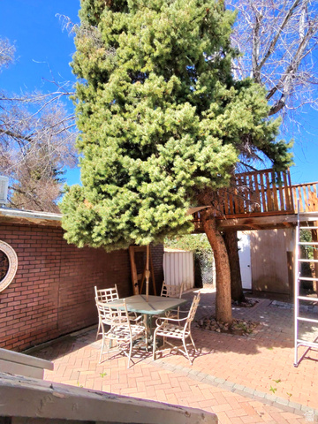 1525 South 400 East, Unit 63 Springville, UT 84663 - Photo 28 of 36 View of patio featuring outdoor dining area and stairway up to tree house