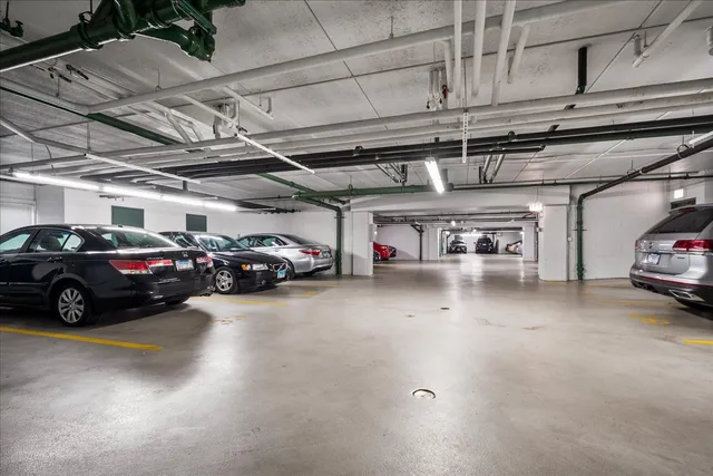 a view of a car parking in a garage