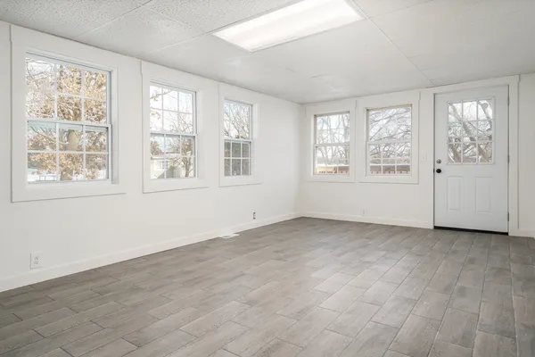 an empty room with windows