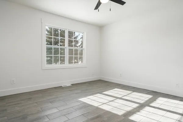 an empty room with windows