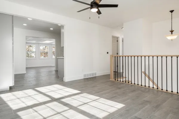 a view of livingroom with hardwood floor and hallway