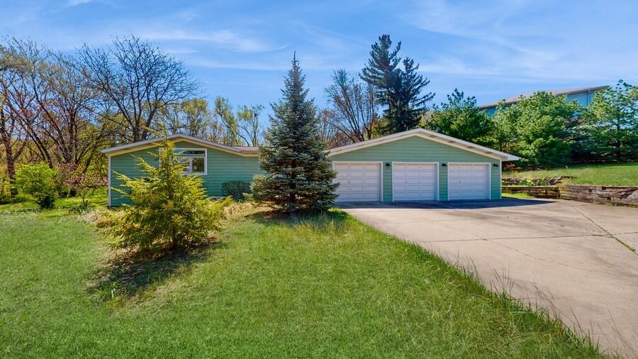 31 Diana Road Portage, IN 46368 - Photo 2 of 29 a front view of a house with a garden