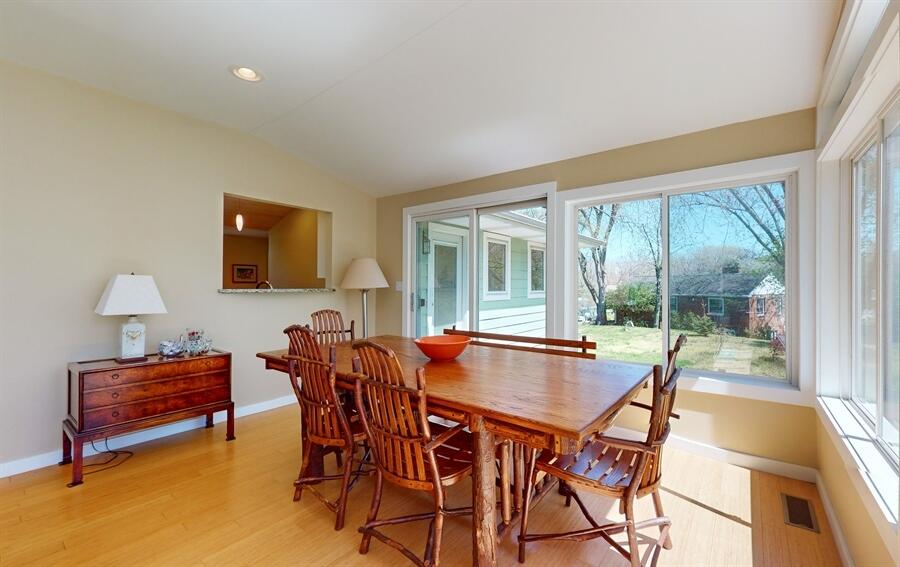 31 Diana Road Portage, IN 46368 - Photo 8 of 29 a dining room with furniture and a floor to ceiling window