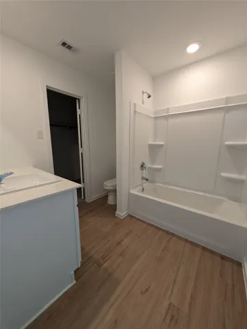 a bathroom with a sink and a toilet