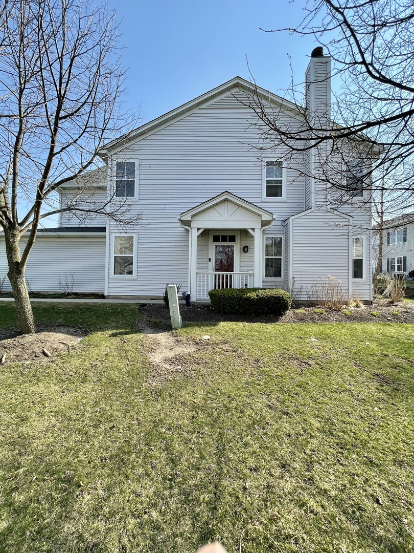 2902 Falling Waters Drive Lindenhurst, IL 60046 - Photo 2 of 14 a front view of a house with a yard