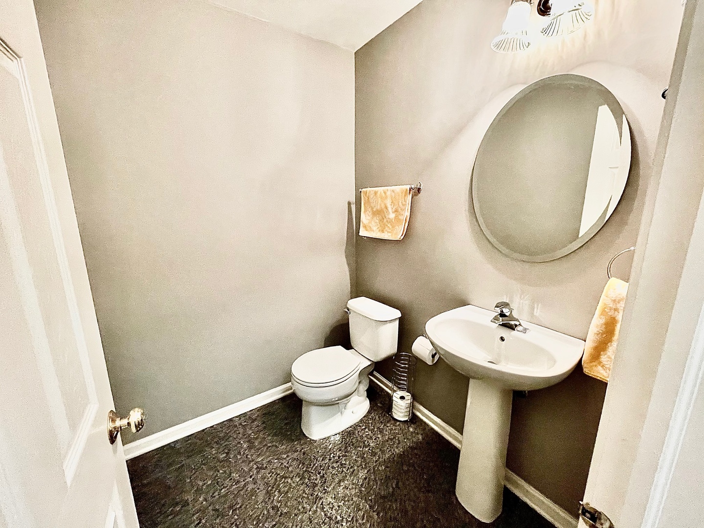 2902 Falling Waters Drive Lindenhurst, IL 60046 - Photo 14 of 14 a bathroom with a toilet sink and mirror