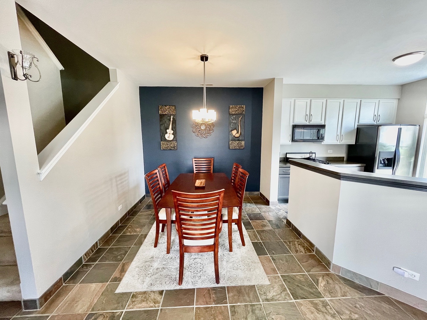 2902 Falling Waters Drive Lindenhurst, IL 60046 - Photo 8 of 14 a dining room with furniture and window