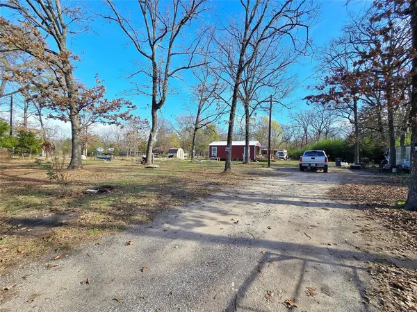 a view of road with trees