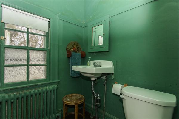 272 Longhill Street Springfield, MA 01108 - Photo 21 of 30 a bathroom with a toilet sink and mirror