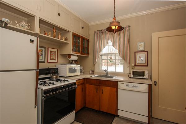 272 Longhill Street Springfield, MA 01108 - Photo 6 of 30 a kitchen with stainless steel appliances a stove a sink and a refrigerator