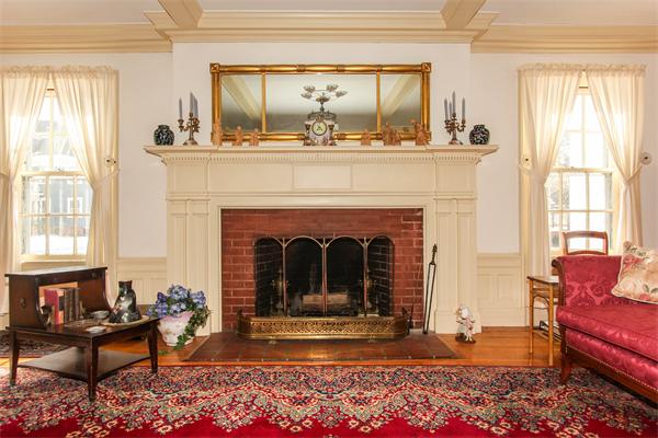 272 Longhill Street Springfield, MA 01108 - Photo 9 of 30 a living room with furniture and a fireplace