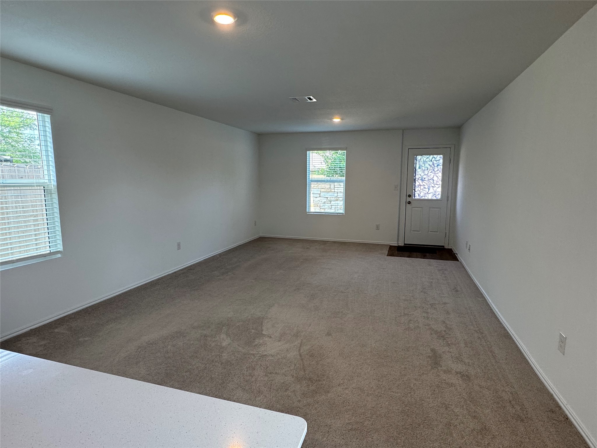 63 Trinity Circle Lockhart, TX 78644 - Photo 5 of 16 A spacious living area with abundant natural light