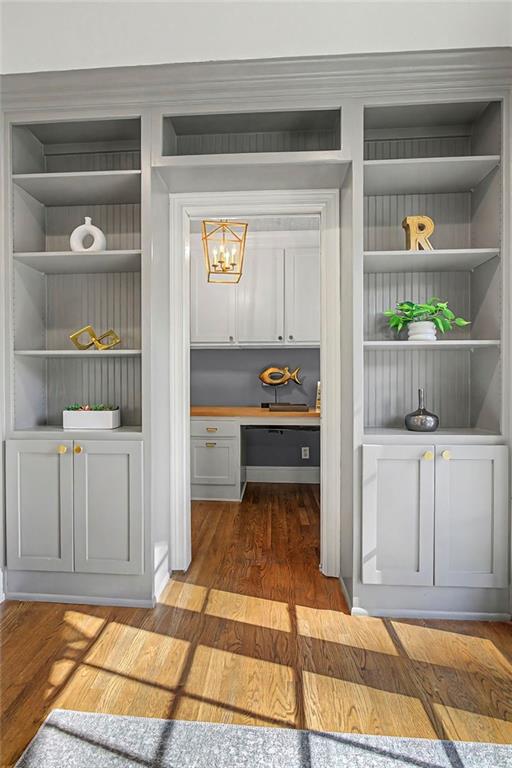 3819 North Stratford Road Northeast Atlanta, GA 30342 - Photo 11 of 48 a living room with a rug and a fireplace
