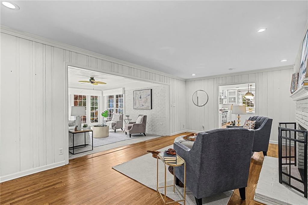 3819 North Stratford Road Northeast Atlanta, GA 30342 - Photo 16 of 48 a view of a dining room with furniture window and wooden floor
