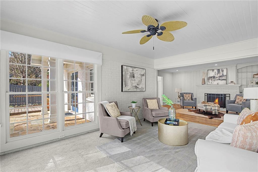 3819 North Stratford Road Northeast Atlanta, GA 30342 - Photo 17 of 48 a living room with furniture and a window