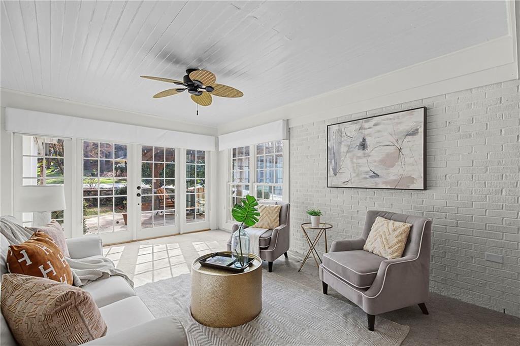 3819 North Stratford Road Northeast Atlanta, GA 30342 - Photo 19 of 48 a living room with furniture and windows