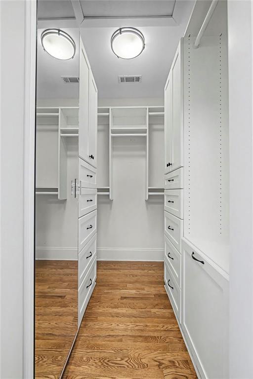 3819 North Stratford Road Northeast Atlanta, GA 30342 - Photo 32 of 48 a bathroom with a double vanity sink and mirror