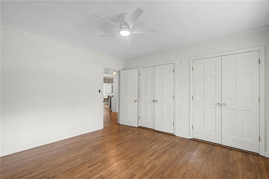 3819 North Stratford Road Northeast Atlanta, GA 30342 - Photo 34 of 48 a view of an empty room with wooden floor