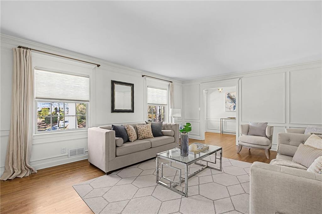 3819 North Stratford Road Northeast Atlanta, GA 30342 - Photo 4 of 48 a living room with furniture and a window