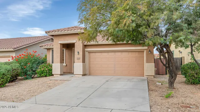 a view of a house with a garage