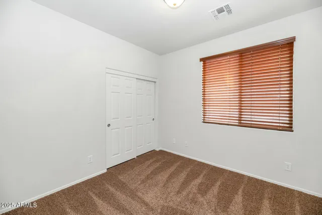 a view of a room with a window