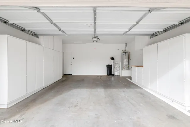 a view of empty room with wooden ceiling