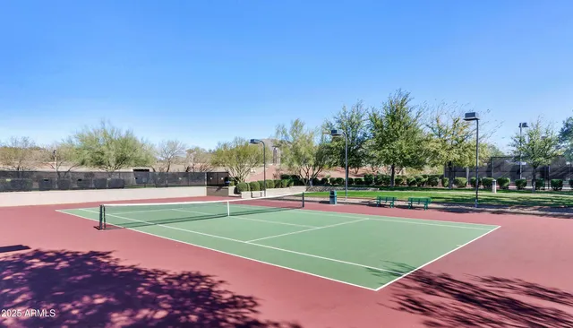 a view of an outdoor space and tennis court