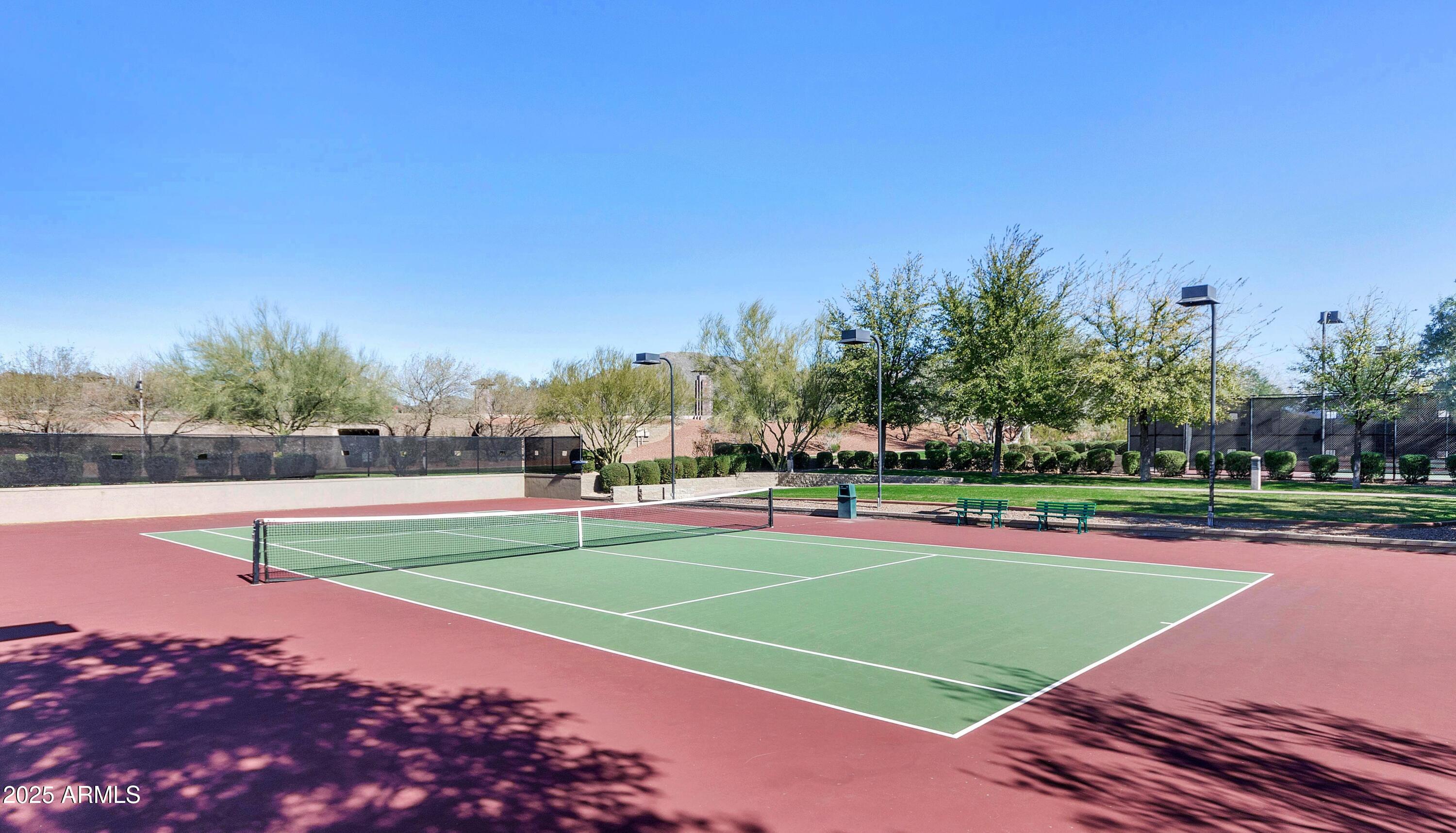 39148 North Acadia Way Anthem, AZ 85086 - Photo 33 of 34 a view of an outdoor space and tennis court