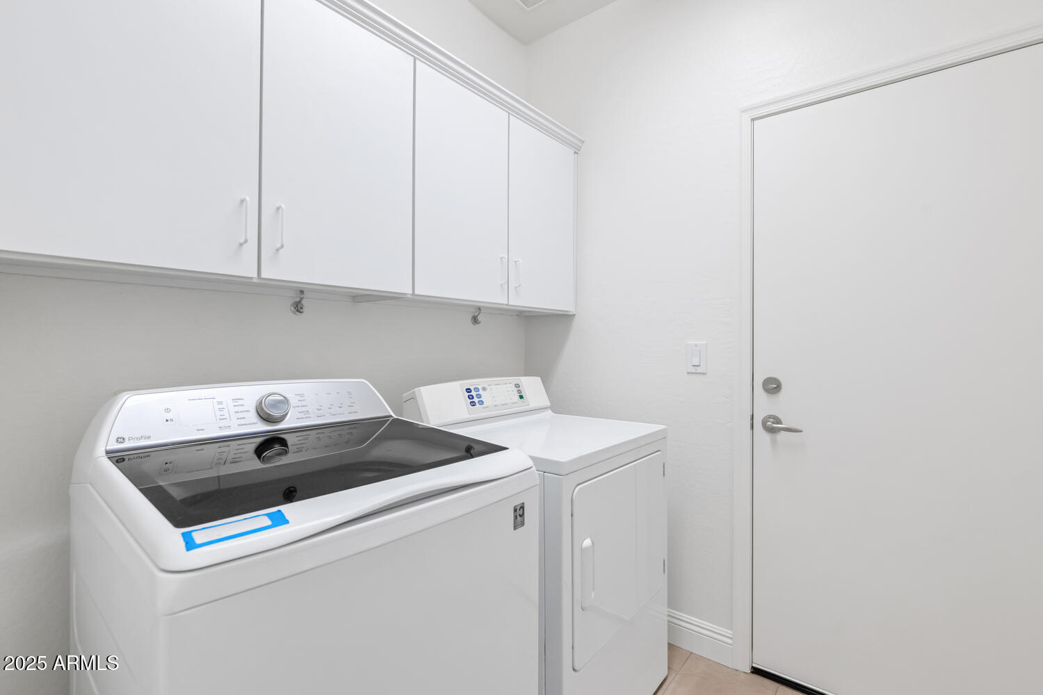 39148 North Acadia Way Anthem, AZ 85086 - Photo 5 of 34 a utility room with dryer and washer