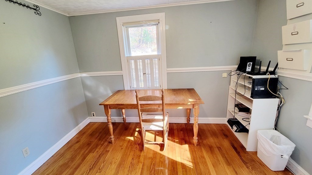 11 North Martin Road Amesbury, MA 01913 - Photo 15 of 28 a living room with furniture and a wooden floor
