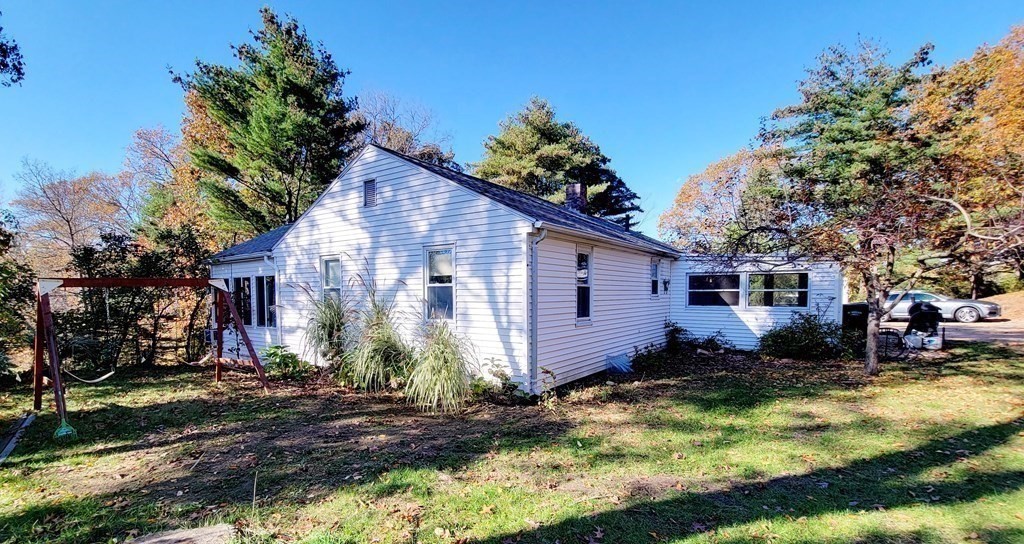 11 North Martin Road Amesbury, MA 01913 - Photo 24 of 28 a view of a house with a yard