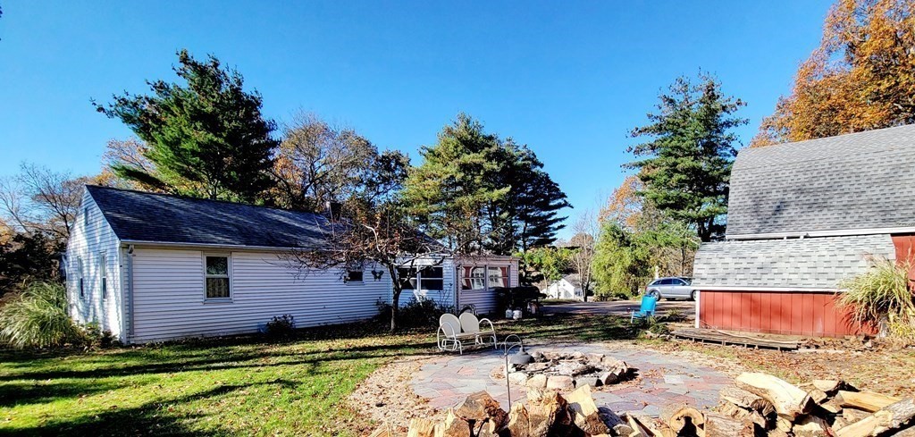 11 North Martin Road Amesbury, MA 01913 - Photo 5 of 28 a view of a house with a yard